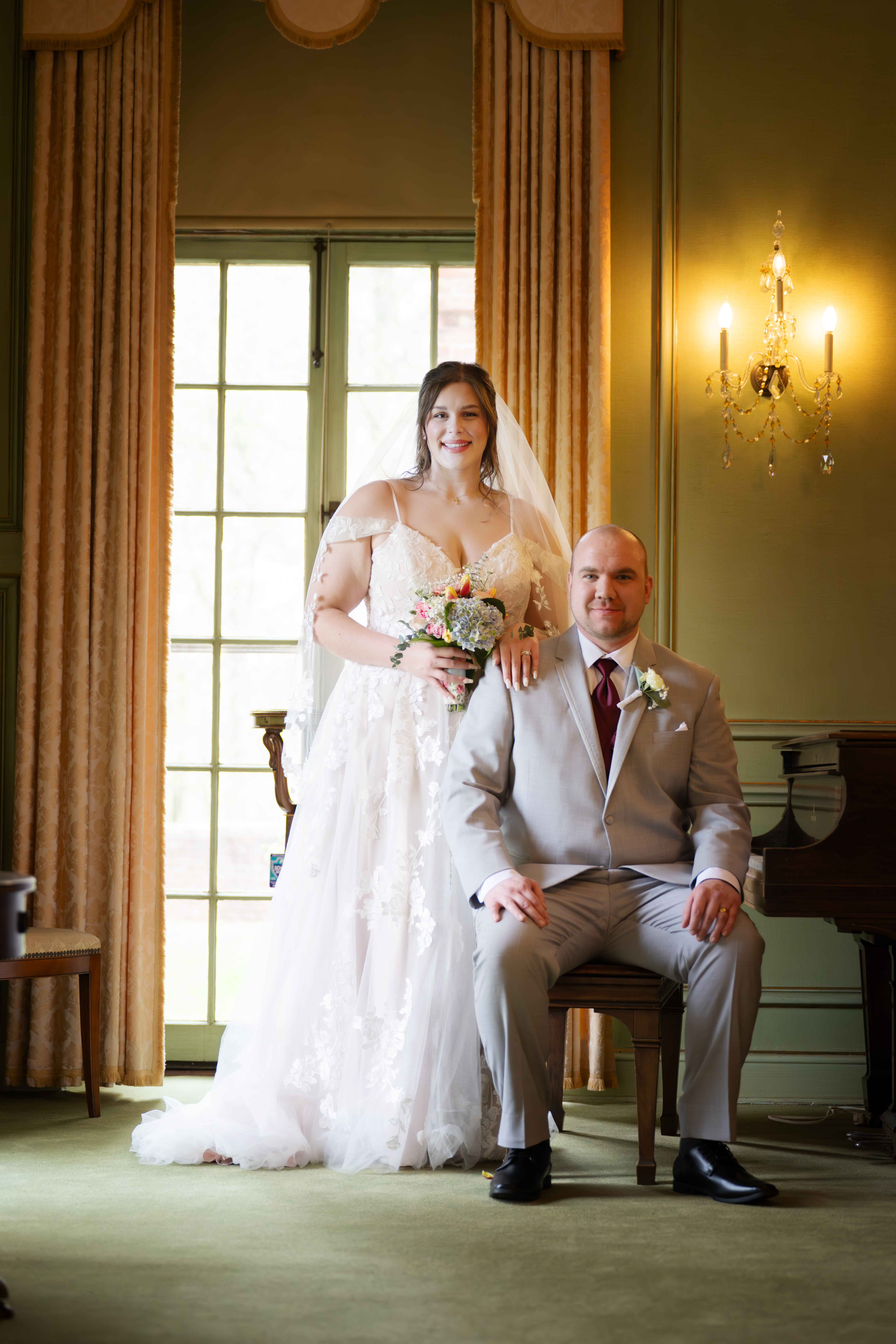 Bride and groom at an elegant Columbus Ohio wedding venue with warm lighting